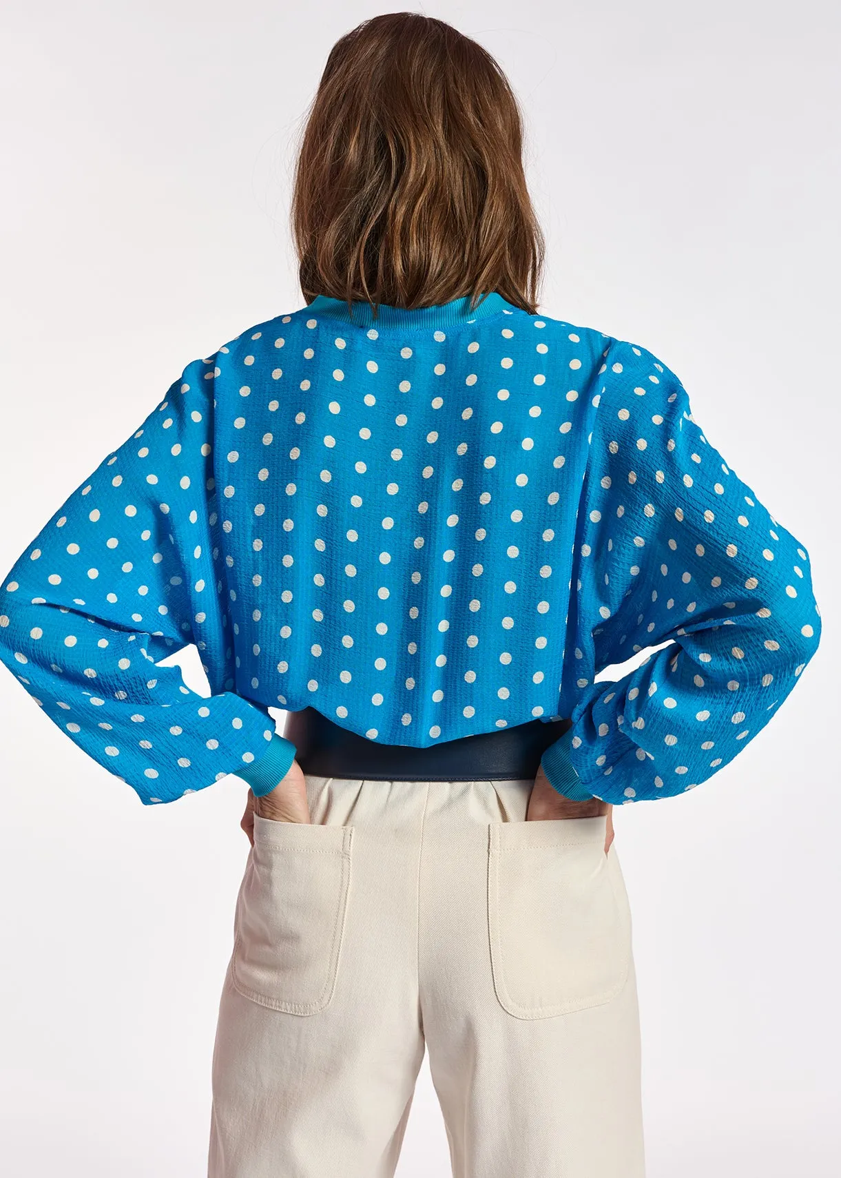 Blue and white polka-dot loose-fit top