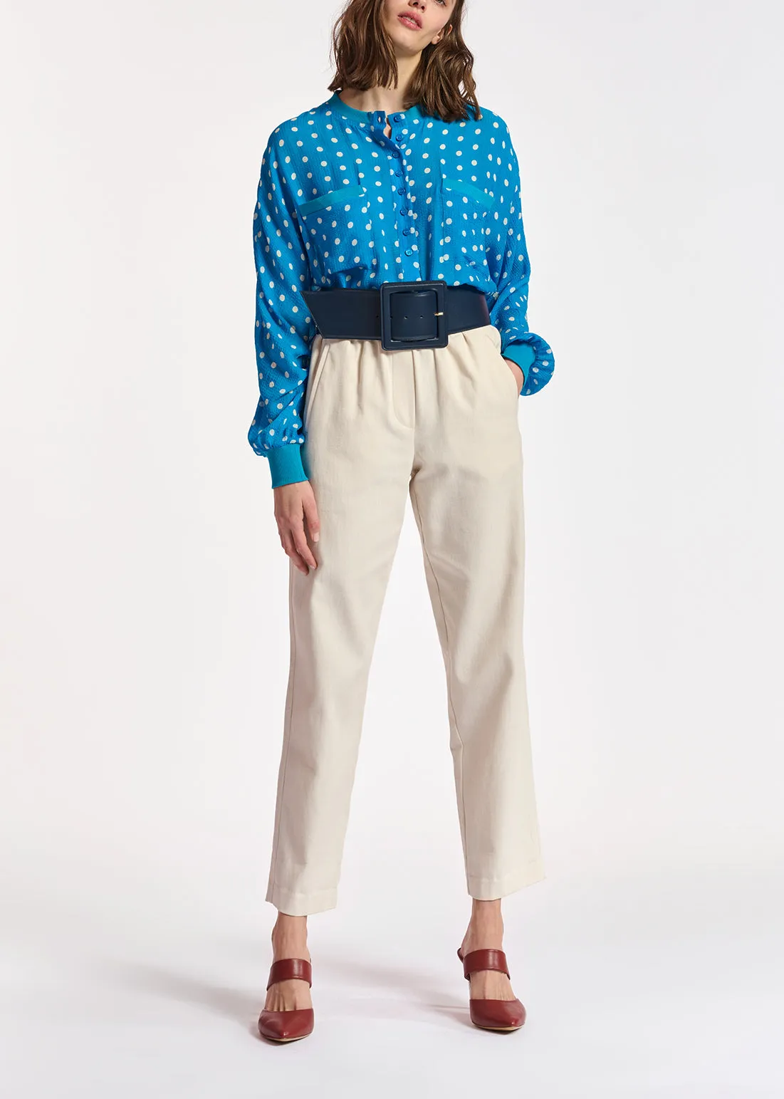 Blue and white polka-dot loose-fit top