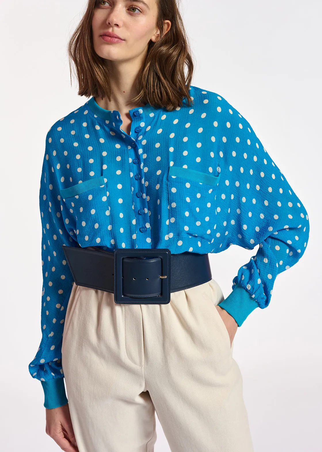 Blue and white polka-dot loose-fit top
