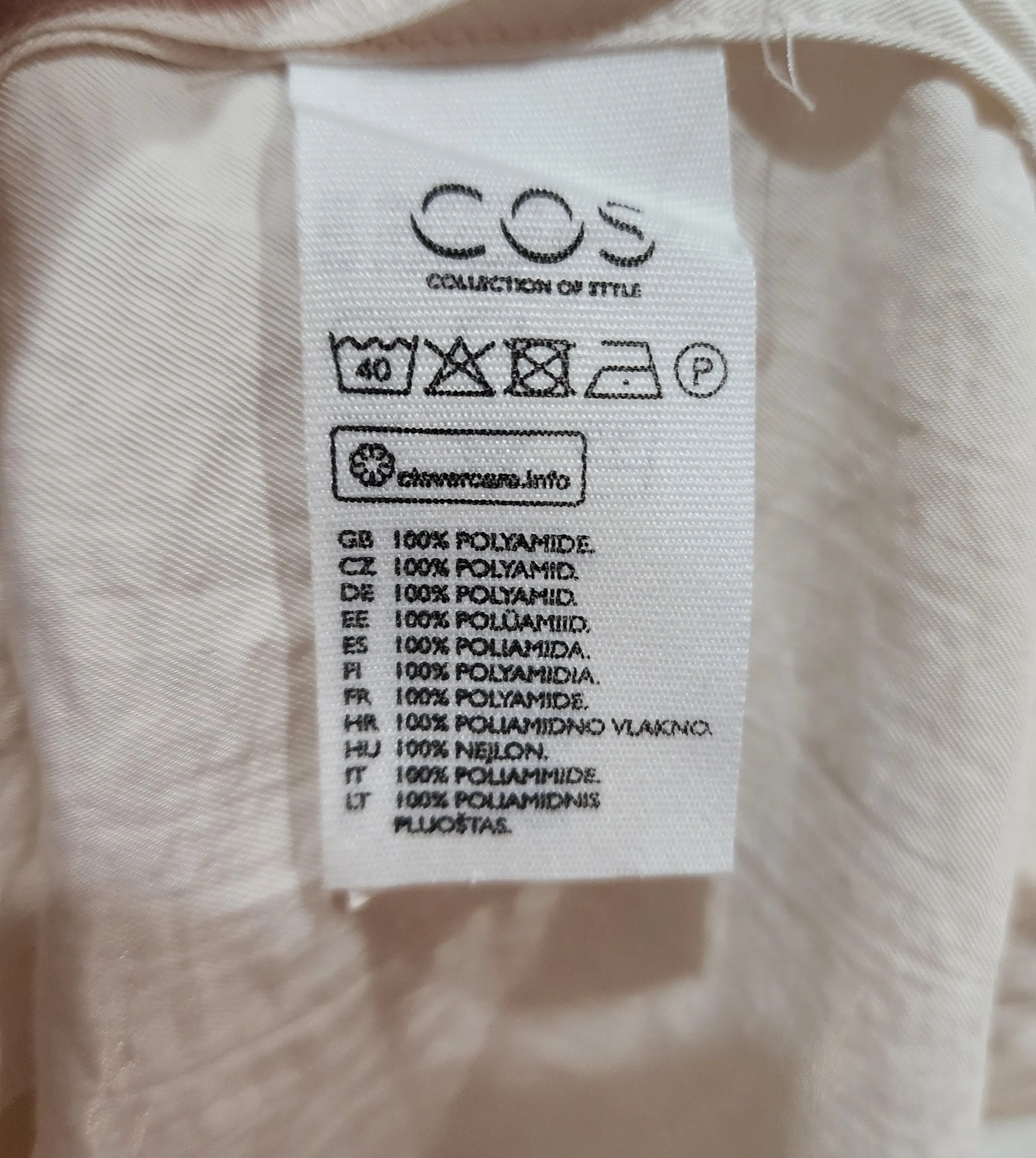 COS cream sleeveless top size 44, best fits 14-16