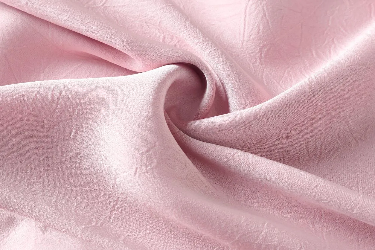 Luxurious Silk Blouse Featuring Slinky Design and Broderie