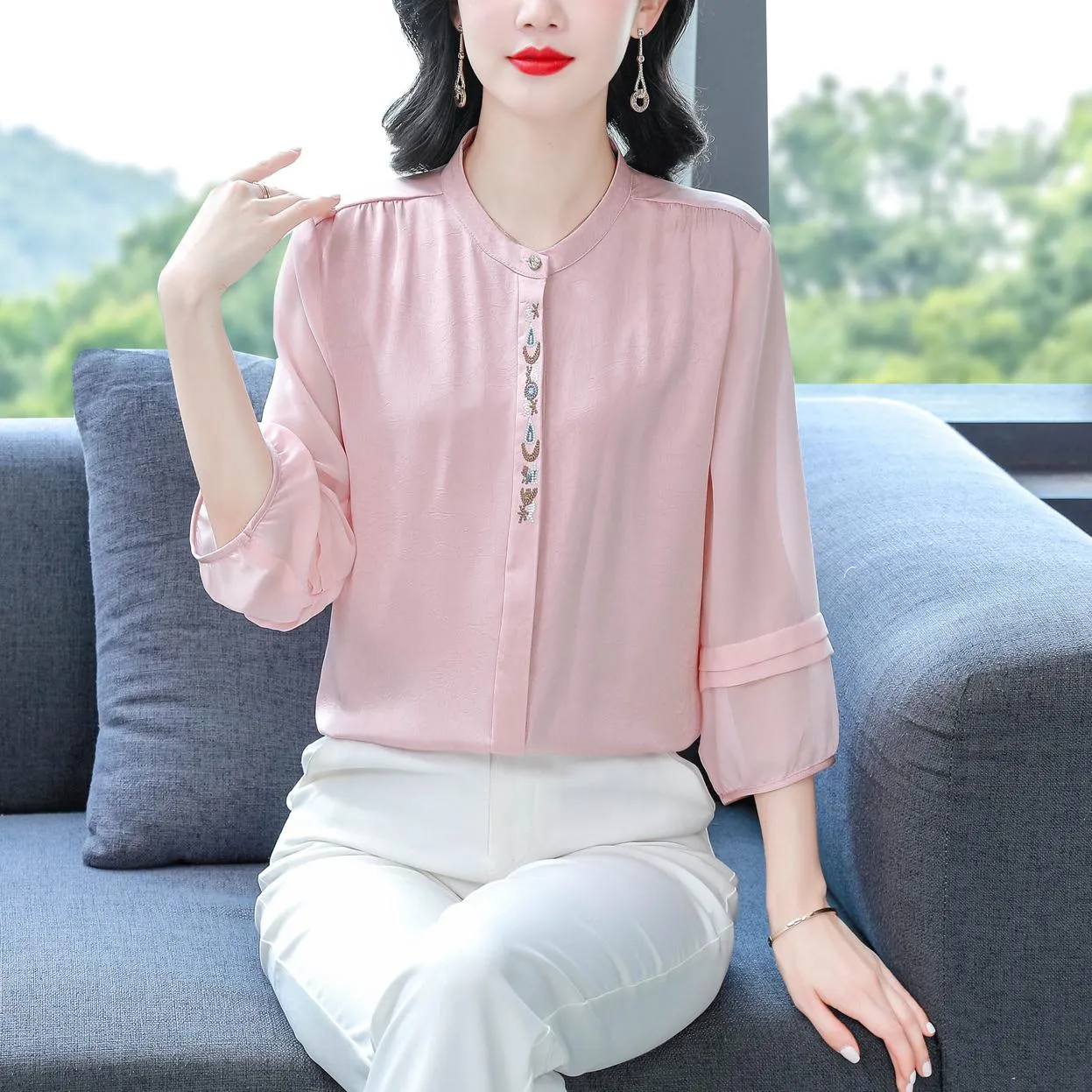 Luxurious Silk Blouse Featuring Slinky Design and Broderie