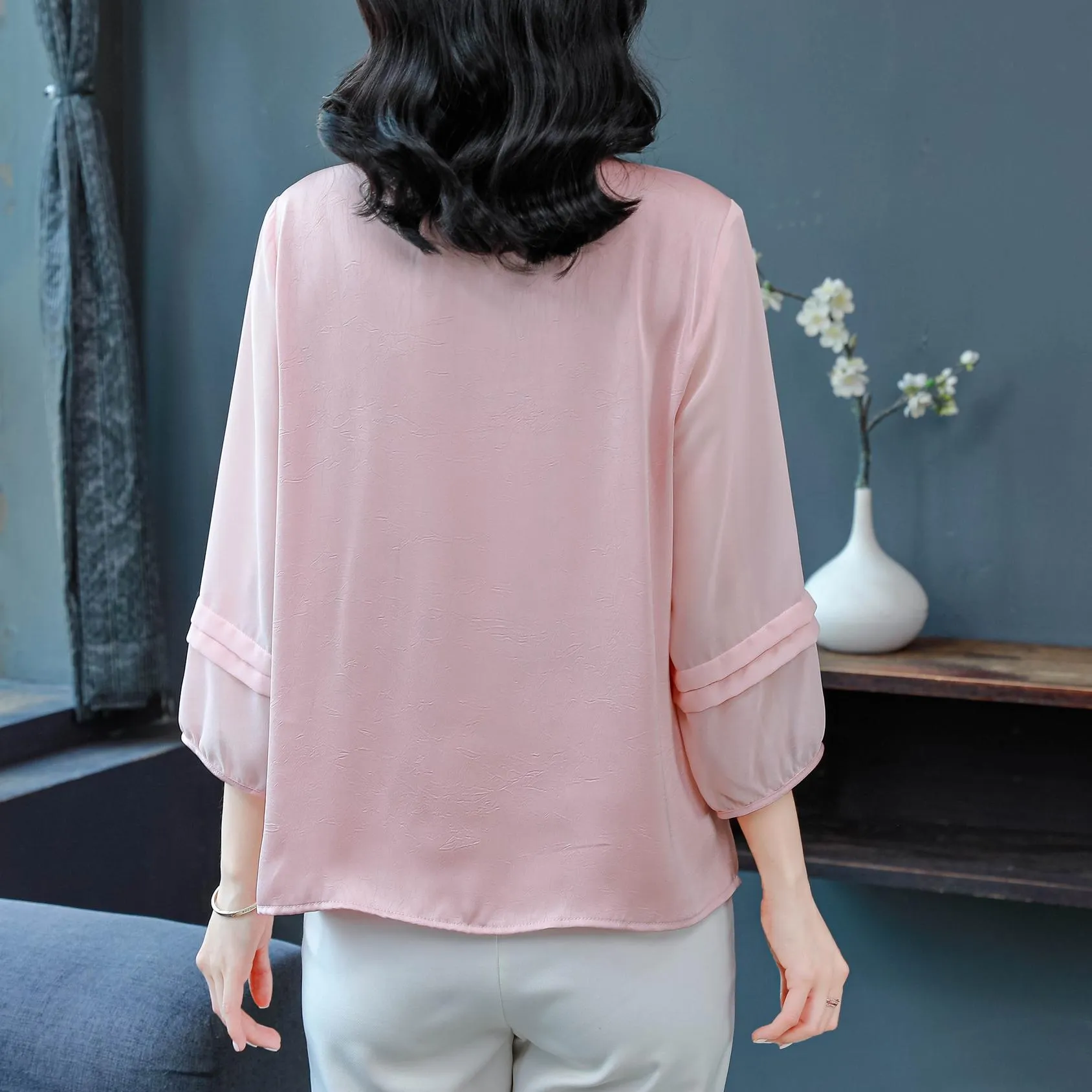Luxurious Silk Blouse Featuring Slinky Design and Broderie