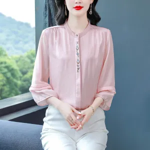 Luxurious Silk Blouse Featuring Slinky Design and Broderie