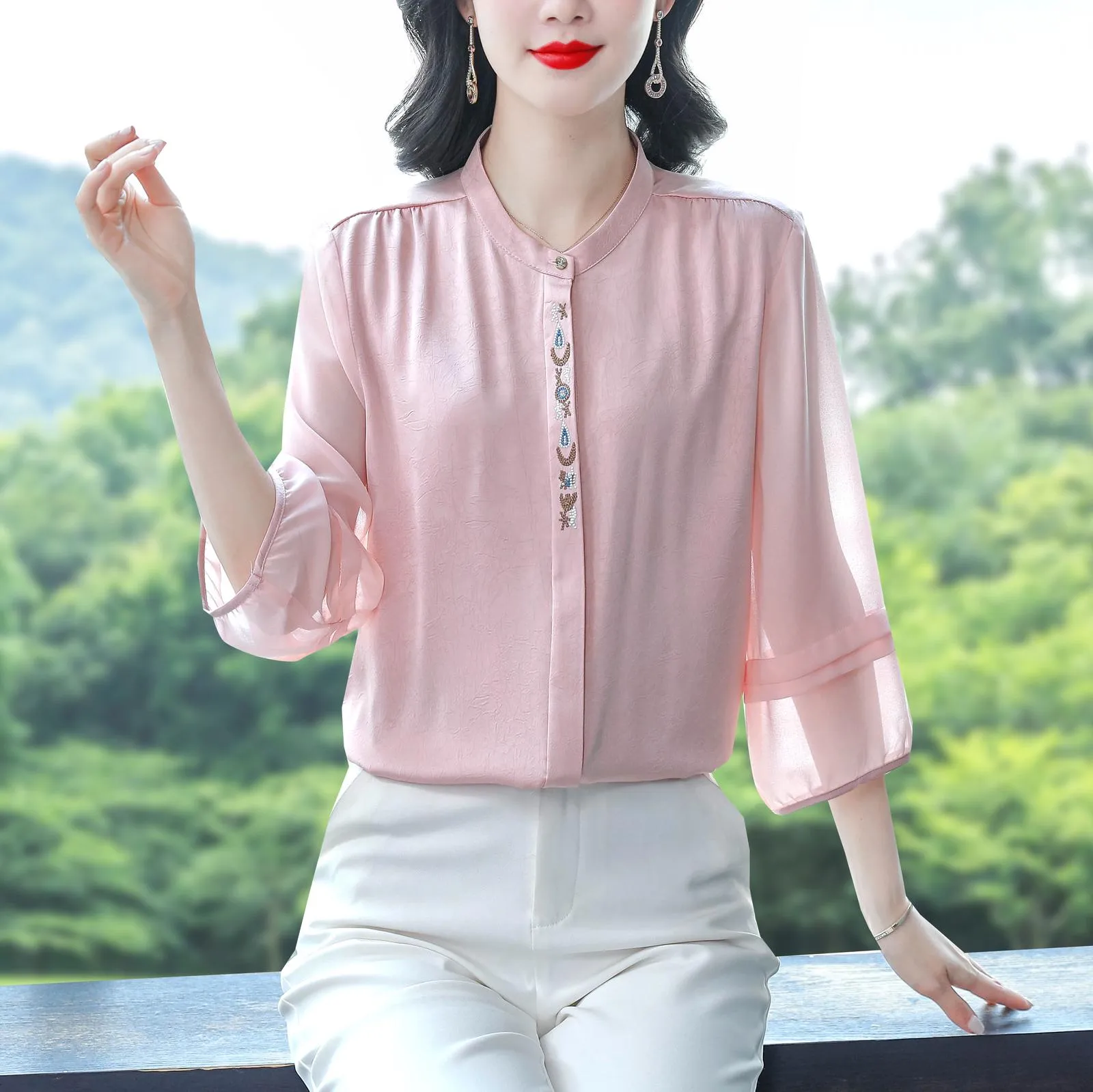 Luxurious Silk Blouse Featuring Slinky Design and Broderie