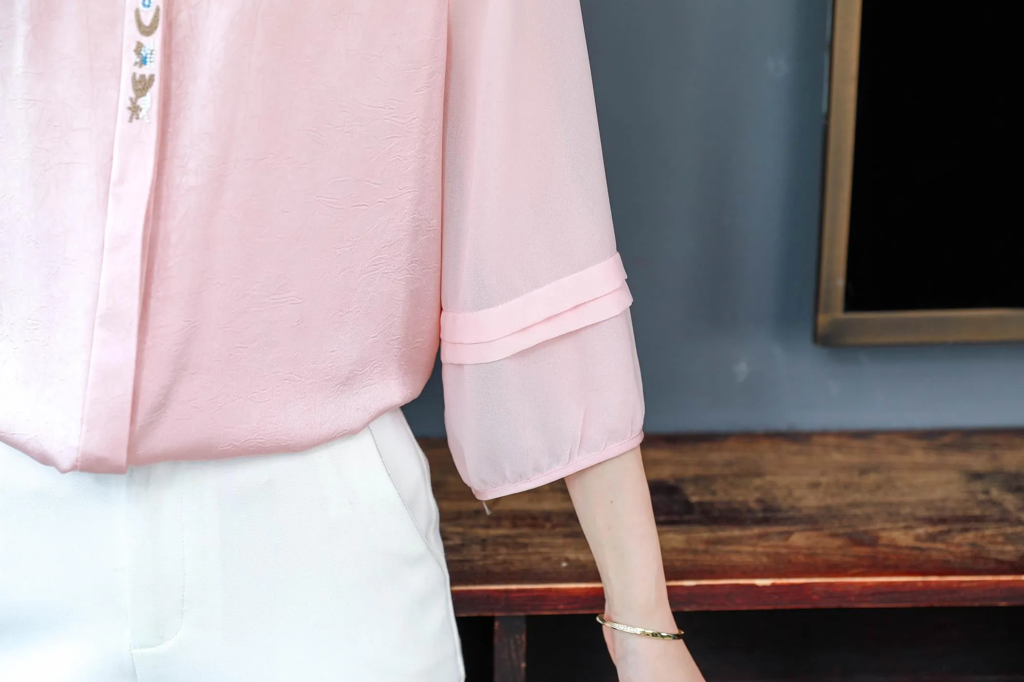 Luxurious Silk Blouse Featuring Slinky Design and Broderie