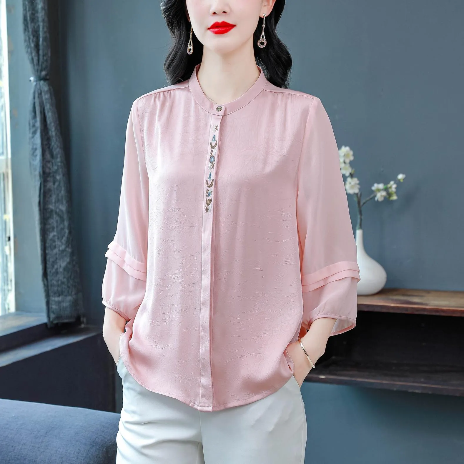 Luxurious Silk Blouse Featuring Slinky Design and Broderie