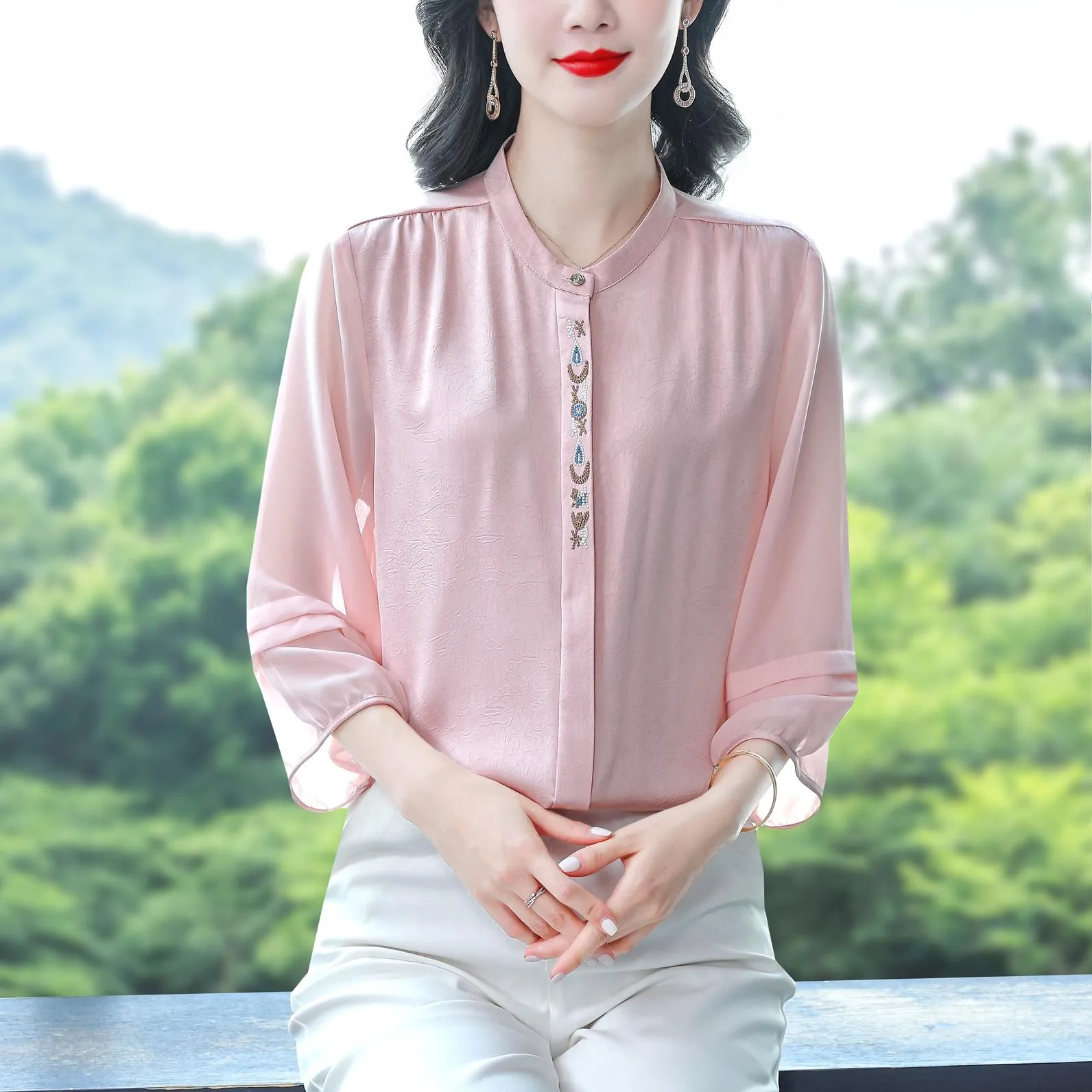 Luxurious Silk Blouse Featuring Slinky Design and Broderie