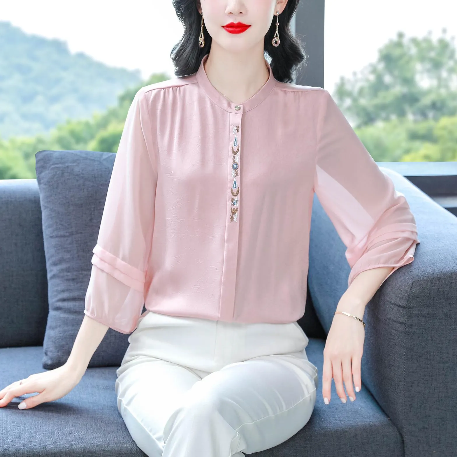 Luxurious Silk Blouse Featuring Slinky Design and Broderie