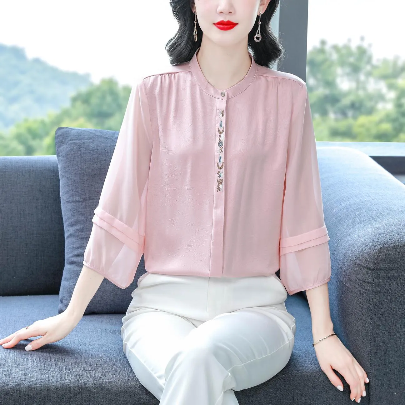 Luxurious Silk Blouse Featuring Slinky Design and Broderie