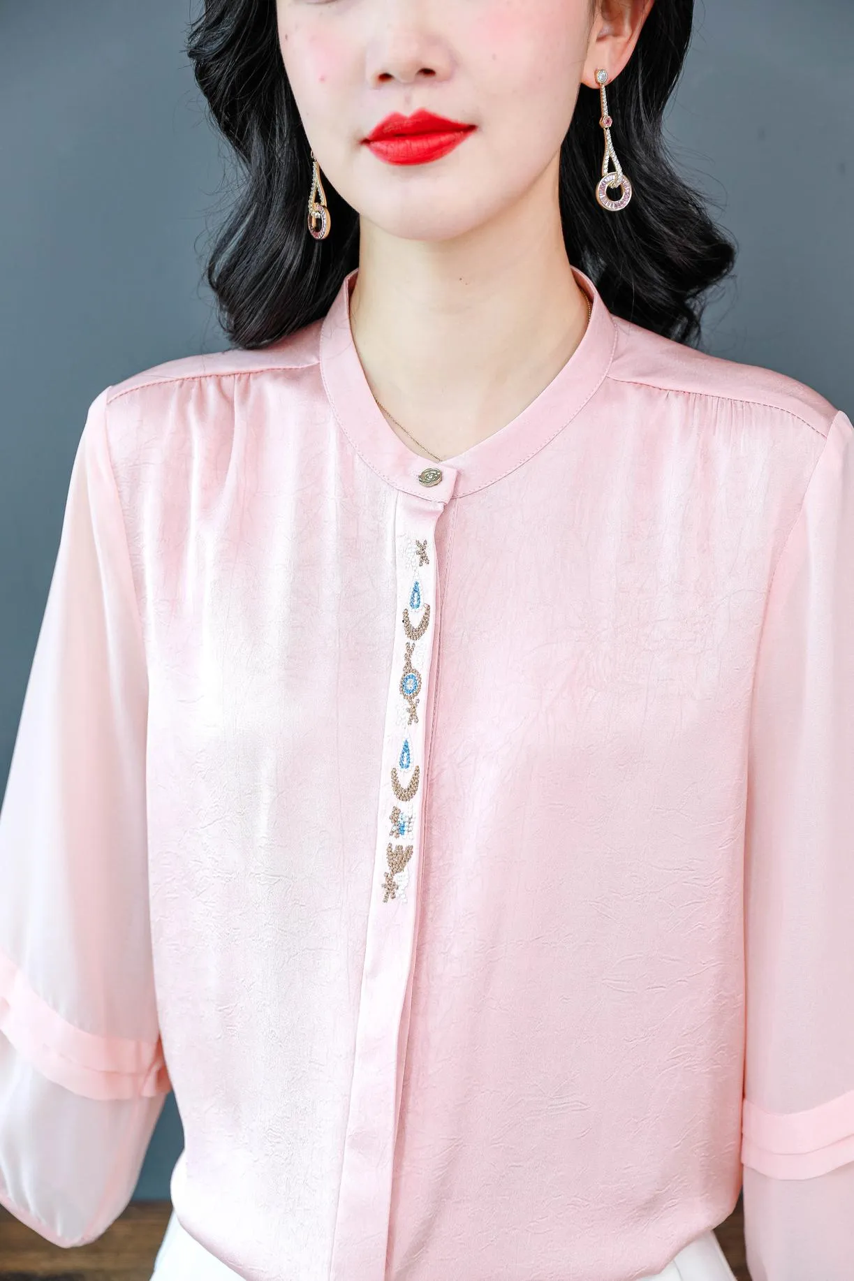 Luxurious Silk Blouse Featuring Slinky Design and Broderie