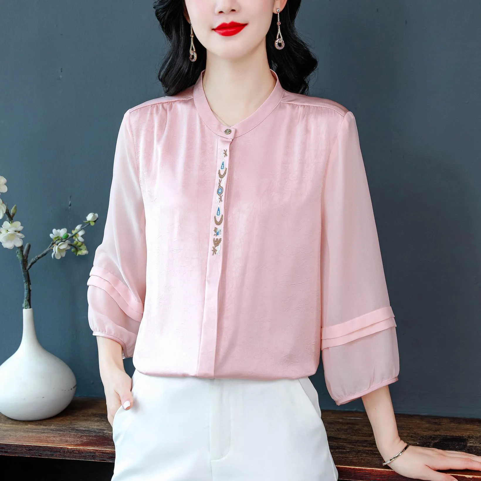 Luxurious Silk Blouse Featuring Slinky Design and Broderie
