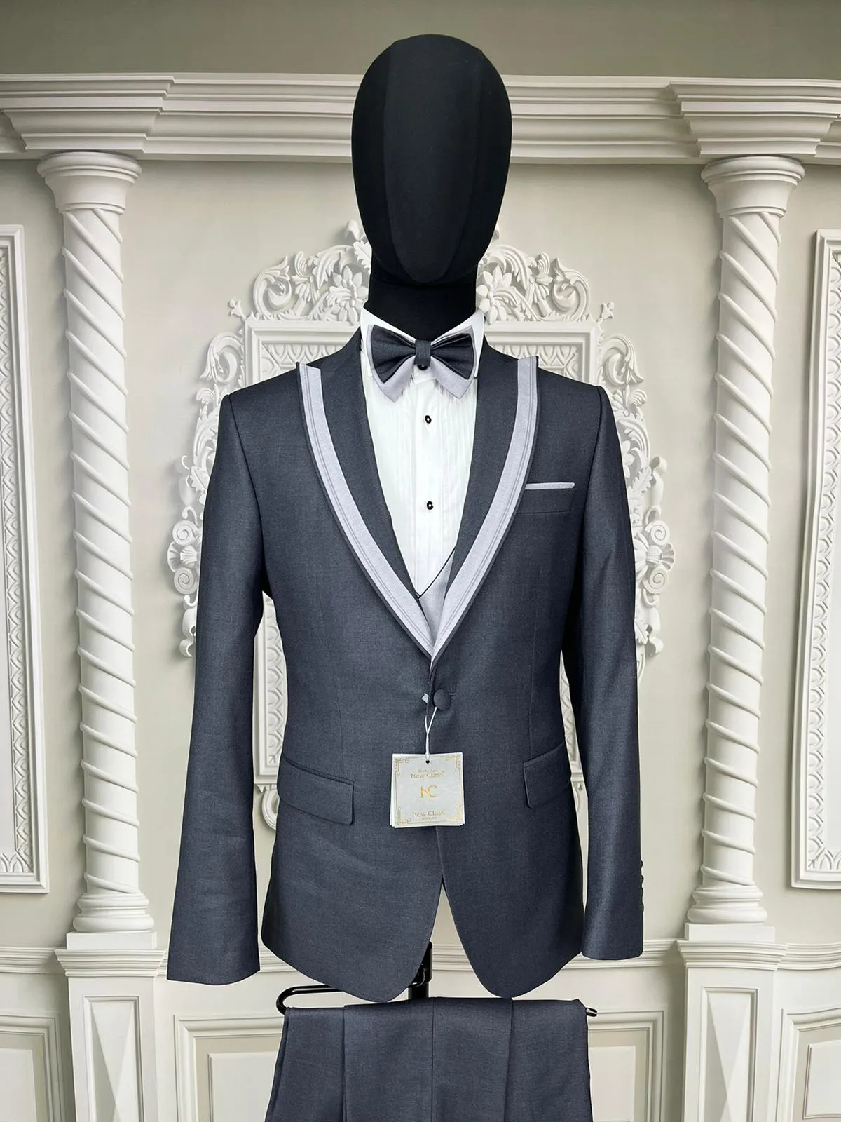 Single Button Three Piece Mens Suit with contrasting blue velvet lapel, matching bow tie and Black Pants