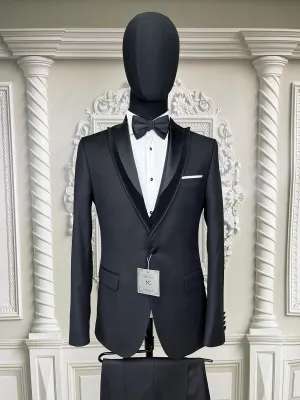 Single Button Three Piece Tuxedo Suit with Contrasting Black SatinLapel, matching bow tie and Black Pants.