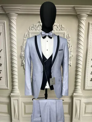Single Button Three Pieces Tuxedo Suit with contrasting green velvet Lapel, matching bow tie and Black Pants.