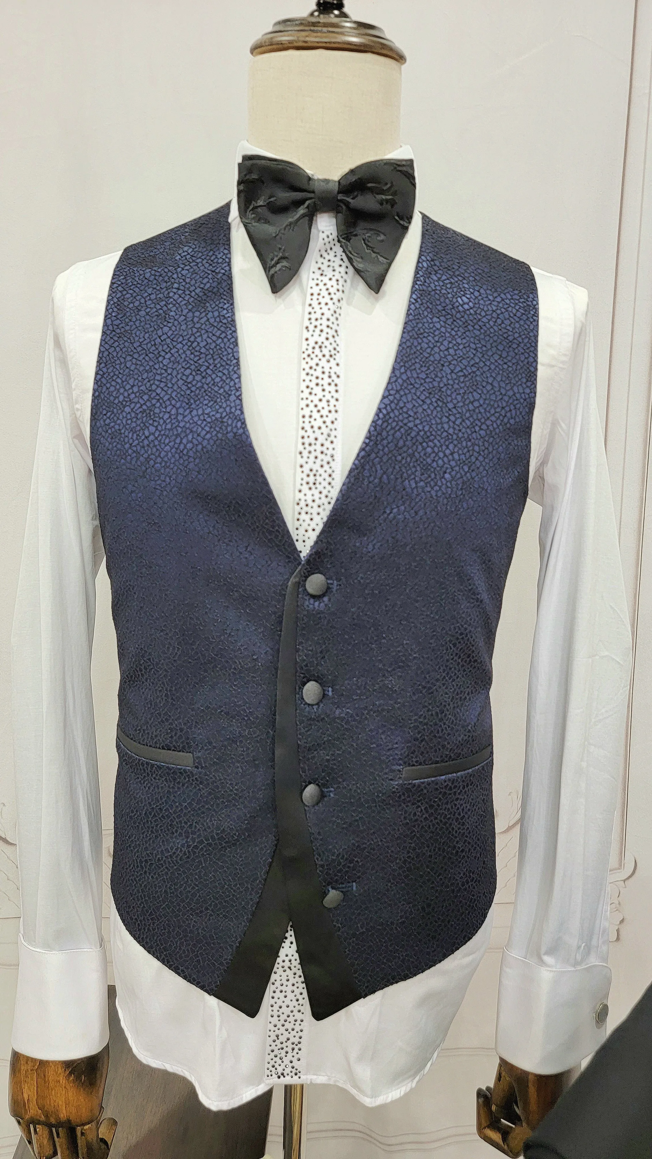 Three Piece Tuxedo Suit with Black Lapel, Matching Bow Tie and Pants.