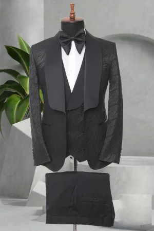 Three Pieces Tuxedo Suit with a Satin Lapel, matching bow tie and Black Pants.