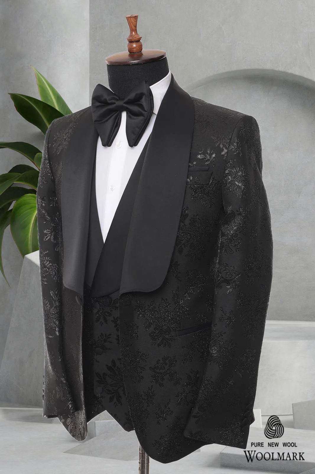 Three Pieces Tuxedo Suit with a Satin Lapel, matching bow tie and Black Pants.