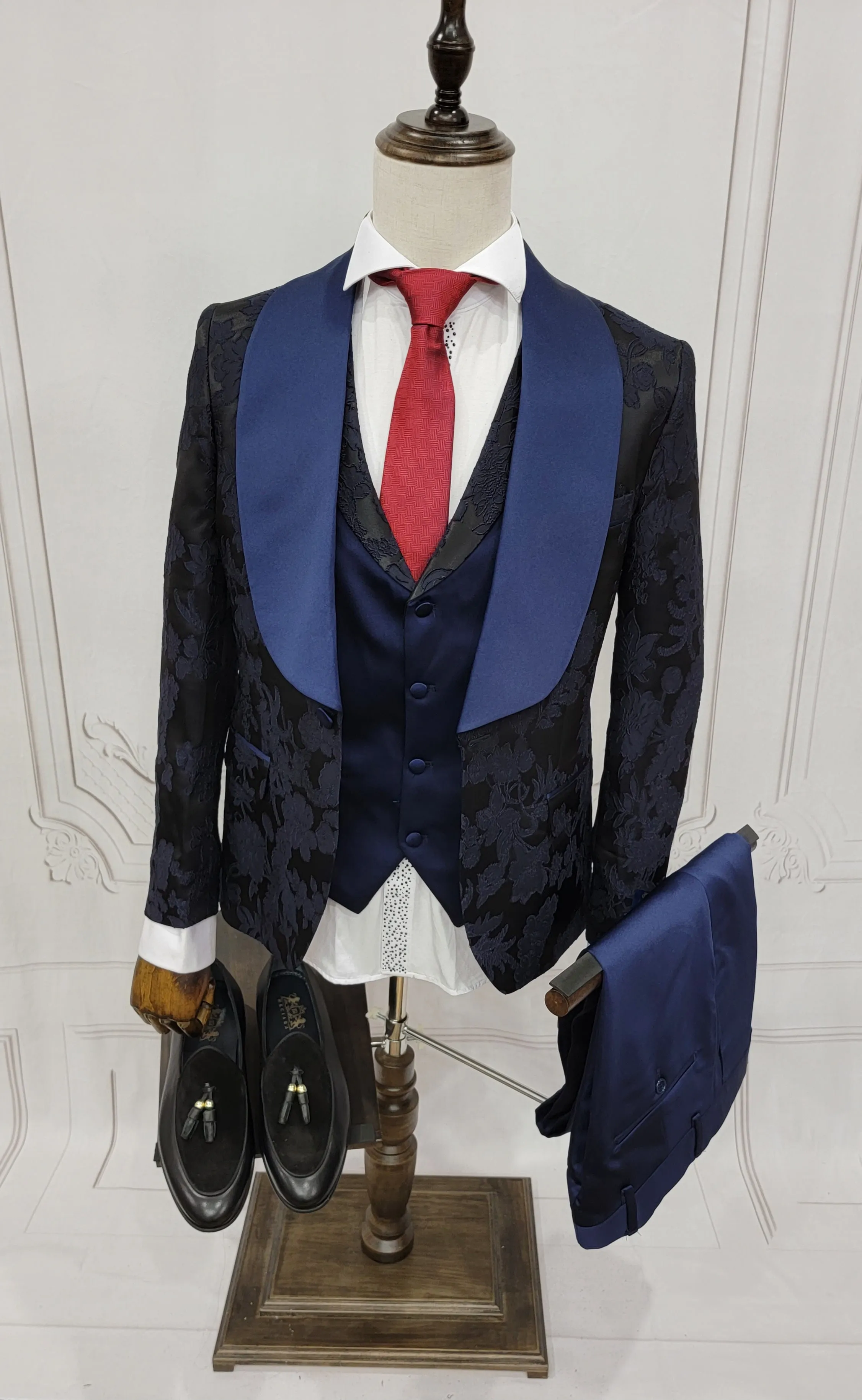 Three Pieces Tuxedo Suit with Blue satin Lapel, matching bow tie and Dress Pants.