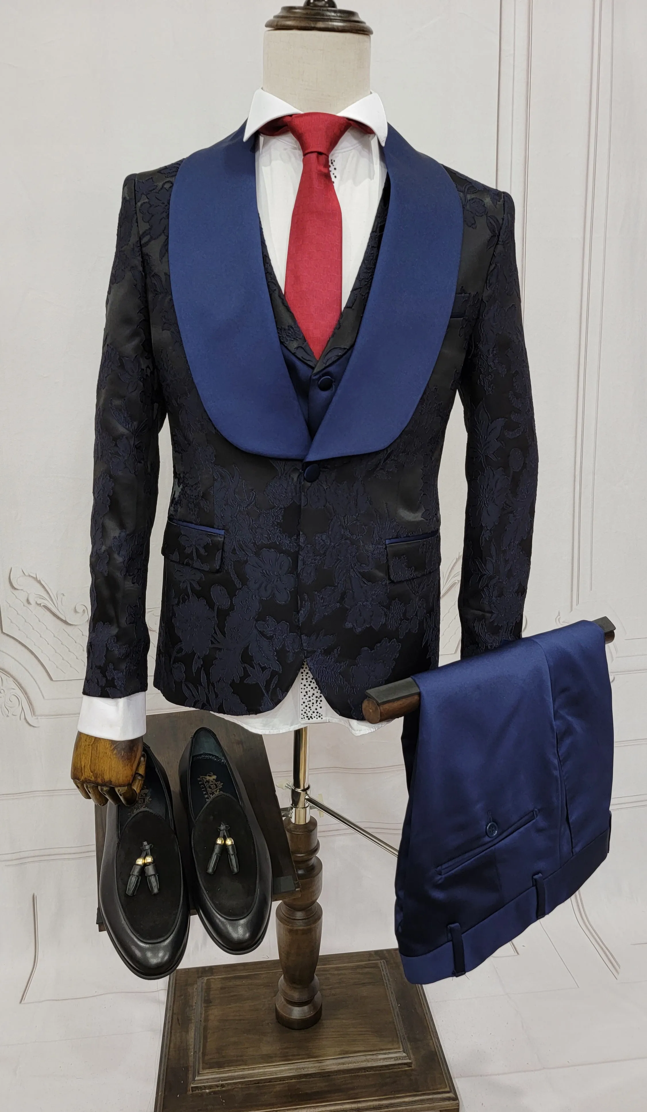 Three Pieces Tuxedo Suit with Blue satin Lapel, matching bow tie and Dress Pants.
